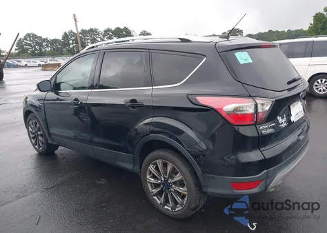2017 Ford Escape Titanium z USA, uszkodzony, nr VIN 1FMCU0JD9HUA27054
